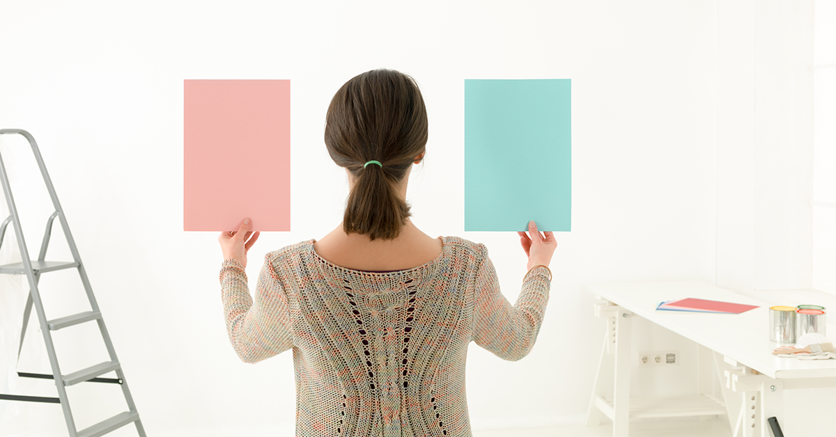 Girl-looking-at-paint-colours